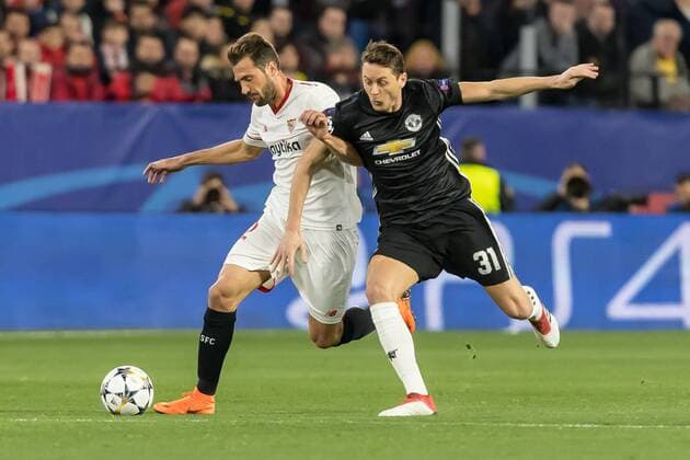 Spain, Sevilla 21.02.2018, UEFA Champions League - 2017 18 Season, Round of 16, First leg, Sevilla FC - Manchester United ManU FC, Franco Vazquez (FCS) und Nemanja Matic (MAN) im Zweikampf ( DeFodi507