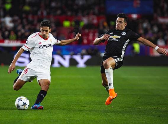 21st February 2018, Ramon Sanchez Pizjuan, Seville, Spain; UEFA Champions League football, round of 16, 1st leg, Sevilla versus Manchester United ManU Jes& xfa;s Navas from Sevilla FC takes a shot past Alexis S& xe1;nchez from Manchester United  ActionPlus11991145