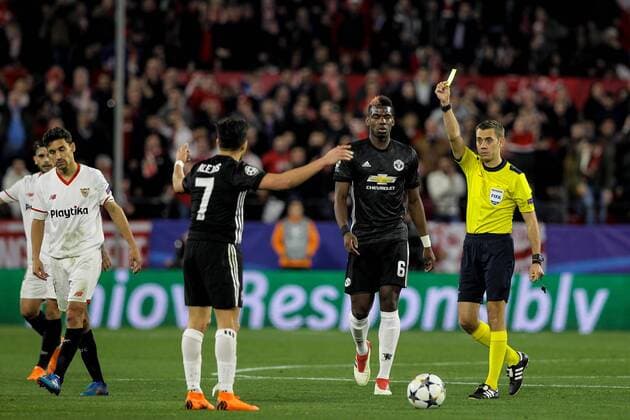 21st February 2018, Ramon Sanchez Pizjuan, Seville, Spain; UEFA Champions League football, round of 16, 1st leg, Sevilla versus Manchester United ManU Alexis Sanchez of Manchester United receives a yellow card  ActionPlus11991197