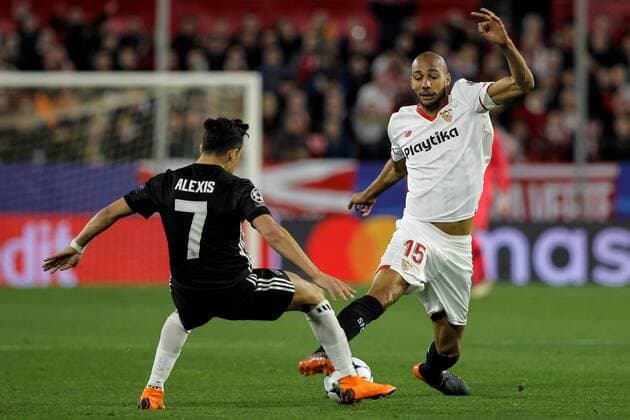 21st February 2018, Ramon Sanchez Pizjuan, Seville, Spain; UEFA Champions League football, round of 16, 1st leg, Sevilla versus Manchester United ManU N Zonzi takes on Alexis Sanchez  ActionPlus11991201
