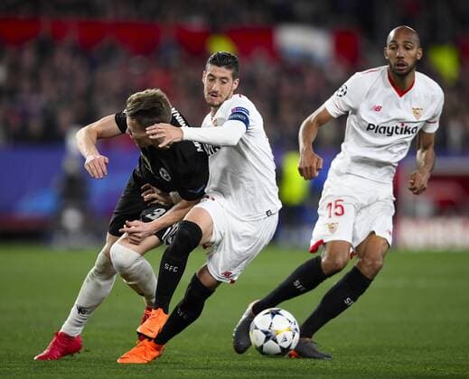 Sevilla; SPAIN-FEBRUARY 21:; (L-R) Scott Mc Tominay of Manchester United ManU Sergio Escudero,Steven N?Zonzi of Sevilla FC during the Champions League match between Sevilla FC v Manchester United at the Sanchez Pizjuan stadium on February 21th; 2018 in Sevilla Spain (PHOTO by Cristobal Duenas  xx xx
