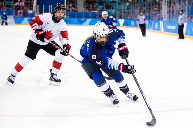180222 Lauriane Rougeau of Canada and Emily Pfalzer of USA during the Women s Ice hockey Eishockey final between USA and Canada during day thirteen of the 2018 Winter Olympics on February 22, 2018 in Pyeongchang. Photo: Petter Arvidson BILDBYRAN kod PA 91993 Copyright: PETTERxARVIDSON BB180222PA049