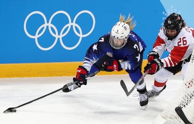 GANGNEUNG, SOUTH KOREA - FEBRUARY 22, 2018: The United Statesâ€™ Monique Lamoureux-Morando (L) and Canadaâ€™s Emily Clark in the women s final Ice hockey Eishockey match as part of the 2018 Winter Olympic Games Olympische Spiele Olympia OS at the Gangneung Hockey Centre. Valery Sharifulin TASS  TS0752B7