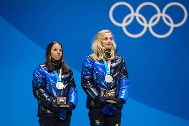 180222 Charlotte Kalla and Stina Nilsson of Sweden, Silver, celebrates with the medals at the Medal Ceremony during day thirteen of the 2018 Winter Olympics on February 22, 2018 in Pyeongchang. Photo: Carl Sandin BILDBYRAN kod CS 57999_316 Copyright: CARLxSANDIN BB180222CS029