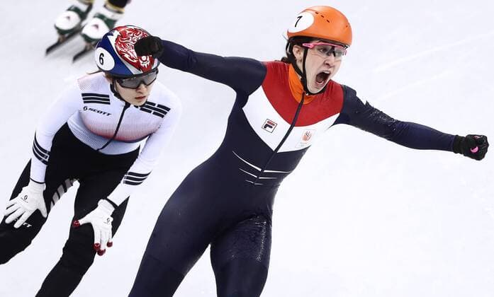 GANGNEUNG, SOUTH KOREA â€“ FEBRUARY 22, 2018: Choi Min-jeong (L) of South Korea and Suzanne Schulting of the Netherlands compete in a ladiesâ€™ 1000m short track Speed skating Eisschnelllauf semifinal race during the 2018 Winter Olympic Games Olympische Spiele Olympia OS at the Gangneung Ice Arena. Valery Sharifulin TASS  TS0753D0