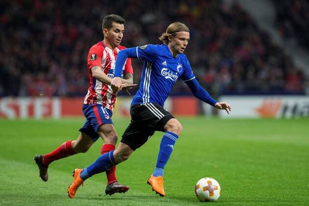 Copenhagen s Peter Ankersen vies for the ball with Atletico de Madrid s Angel Correa during the UEFA Europa League match between Atletico de Madrid and Copenhagen at the Wanda Metropolitano stadium in Madrid, Spain, 22 February 2018. Atletico de Madrid vs. Copenhagen !ACHTUNG: NUR REDAKTIONELLE NUTZUNG!  Copyright: xRodrigoxJimenezx MAD016 20180222-636549286652509073