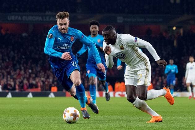180222 Arsenals Calum Chambers och Östersunds Ken Sema under fotbollsmatchen i Europa League mellan Arsenal och Östersund den 22 februari 2018 i London. Copyright: ANDREASxLxERIKSSON BB180222AE028