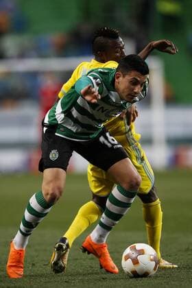February 22, 2018 - Lisbon, Portugal - Sporting s midfielder Rodrigo Battaglia (L) vies for the ball with Astana s forward Patrick Twumasi (R) during UEFA Europa League round of 32 second leg football match between Sporting CP vs FC Astana, in Lisbon, on February 21, 2018. Sporting Lisbon v FC Astana - UEFA Europa League  - ZUMAn230 20180222_zaa_n230_488 Copyright: xCarlosxPalmax
