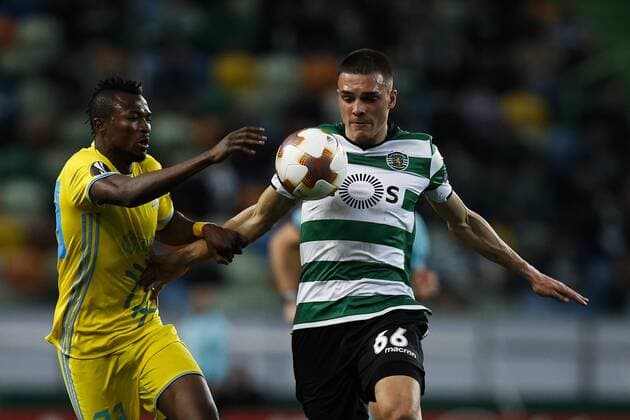 February 22, 2018 - Lisbon, Portugal - Astana s forward Patrick Twumasi (L) vies for the ball with Sporting s midfielder Joao Palhinha (R) during UEFA Europa League round of 32 second leg football match between Sporting CP vs FC Astana, in Lisbon, on February 21, 2018. Sporting Lisbon v FC Astana - UEFA Europa League  - ZUMAn230 20180222_zaa_n230_495 Copyright: xCarlosxPalmax