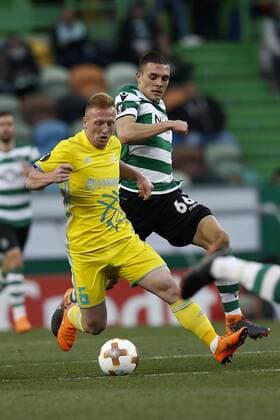 February 22, 2018 - Lisbon, Portugal - Astana s midfielder Laszlo Tleinheisler (L) vies for the ball with Sporting s midfielder Joao Palhinha (R) during UEFA Europa League round of 32 second leg football match between Sporting CP vs FC Astana, in Lisbon, on February 21, 2018. Sporting Lisbon v FC Astana - UEFA Europa League  - ZUMAn230 20180222_zaa_n230_515 Copyright: xCarlosxPalmax
