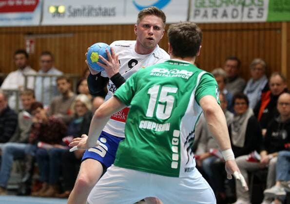 v.li.: Daniel Luther (ThSV Eisenach), Sergej Gorpishin (DJK Rimpar Wölfe), DKB 2. Handball-Bundesliga, DJK Rimpar Wölfe - ThSV Eisenach,