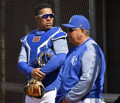 February 22, 2018 - Surprise, AZ, USA - Kansas City Royals senior coordinator Chino Cadahia, right, walks with catcher Salvador Perez during spring training on Thursday, Feb. 22, 2018, in Surprise, Ariz. Kansas City Royals spring training - ZUMAm67_ 20180222_zaf_m67_040 Copyright: xJohnxSleezerx
