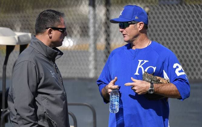 February 22, 2018 - Surprise, AZ, USA - Kansas City Royals special assistant Mike Sweeney, right, talks with assistant general manager J.J. Picollo during spring training on Thursday, Feb. 22, 2018, in Surprise, Ariz. Kansas City Royals spring training - ZUMAm67_ 20180222_zaf_m67_041 Copyright: xJohnxSleezerx