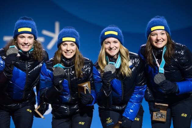180223 Hanna Öberg, Anna Magnusson, Mona Brorsson and Linn Persson of Sweden Silver, celebrates at the Medal Ceremony for the Women s Biathlon 4x6 km relay during day fourteen of the 2018 Winter Olympics on February 23, 2018 in Pyeongchang. Photo: Joel Marklund BILDBYRAN kod JM 87647 Copyright: JOELxMARKLUND BB180223JM071