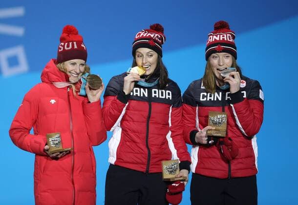 (180223) -- PYEONGCHANG, Feb. 23, 2018 -- Gold medalist Kelsey Serwa (C) of Canada, silver medalist Brittany Phelan (R) of Canada and bronze medalist Fanny Smith of Switzerland pose for photos during medal ceremony of ladies ski cross of freestyle skiing at the 2018 PyeongChang Winter Olympic Games Olympische Spiele Olympia OS at Medal Plaza, PyeongChang, South Korea, Feb. 23, 2018. ) (SP)OLY-SOUTH KOREA-PYEONGCHANG-FREESTYLE SKIING-LADIES SKI CROSS-MEDAL CEREMONY BaixXuefei 
