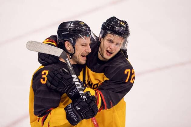 180223 Patrick Reimer of Germany and Dominick Kahun of Germany celebrates in the Men s Ice hockey Eishockey semifinal between Canada and Germany during day fourteen of the 2018 Winter Olympics on February 23, 2018 in Pyeongchang. Photo: Petter Arvidson BILDBYRAN kod PA 91999 Copyright: PETTERxARVIDSON BB180223PA108