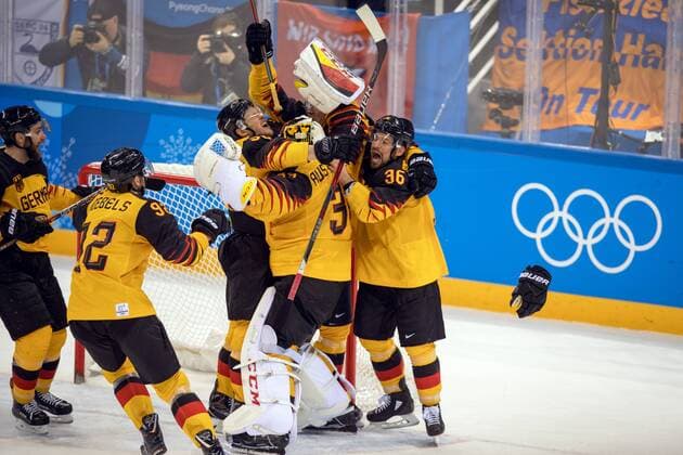 180223 The German team celebrates after the Men s Ice hockey Eishockey semifinal between Canada and Germany during day fourteen of the 2018 Winter Olympics on February 23, 2018 in Pyeongchang. Photo: Petter Arvidson BILDBYRAN kod PA 91999 Copyright: PETTERxARVIDSON BB180223PA122
