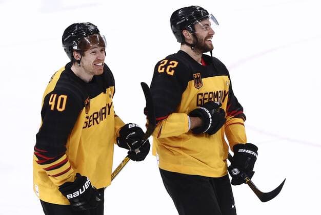 GANGNEUNG, SOUTH KOREA â€“ FEBRUARY 23, 2018: Germany s Bjorn Krupp (L) and Matthias Plachta react after winning their men s semifinal Ice hockey Eishockey match against Canada during the 2018 Winter Olympic Games Olympische Spiele Olympia OS at the Gangneung Hockey Centre. Team Germany won the game 4-3 and propelled to the final. Valery Sharifulin TASS  TS0757B8