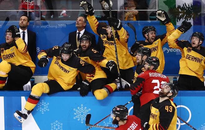 GANGNEUNG, SOUTH KOREA â€“ FEBRUARY 23, 2018: Germany s players celebrate winning their men s semifinal Ice hockey Eishockey match against Canada during the 2018 Winter Olympic Games Olympische Spiele Olympia OS at the Gangneung Hockey Centre. Team Germany won the game 4-3 and propelled to the final. Valery Sharifulin TASS  TS0757BA