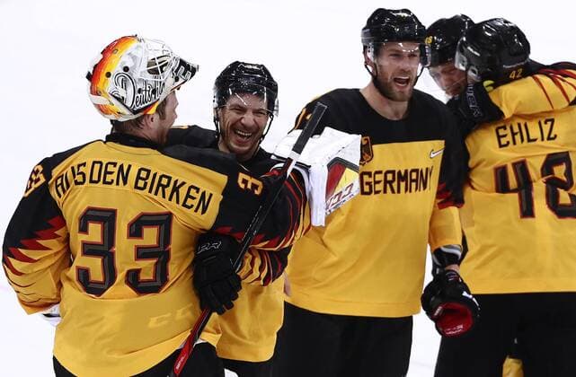 GANGNEUNG, SOUTH KOREA â€“ FEBRUARY 23, 2018: Germany s players celebrate winning their men s semifinal Ice hockey Eishockey match against Canada during the 2018 Winter Olympic Games Olympische Spiele Olympia OS at the Gangneung Hockey Centre. Team Germany won the game 4-3 and propelled to the final. Valery Sharifulin TASS  TS0757BB
