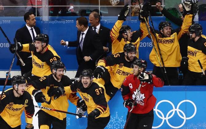 GANGNEUNG, SOUTH KOREA â€“ FEBRUARY 23, 2018: Germany s players celebrate winning their men s semifinal Ice hockey Eishockey match against Canada during the 2018 Winter Olympic Games Olympische Spiele Olympia OS at the Gangneung Hockey Centre. Team Germany won the game 4-3 and propelled to the final. Valery Sharifulin TASS  TS0757BE