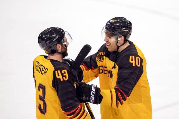 180223 Gerrit Fauser and Björn Krupp of Germany celebrate after the Men s Ice hockey Eishockey semifinal between Canada and Germany during day fourteen of the 2018 Winter Olympics on February 23, 2018 in Pyeongchang. Photo: Petter Arvidson BILDBYRAN kod PA 91999 Copyright: PETTERxARVIDSON BB180223PA140