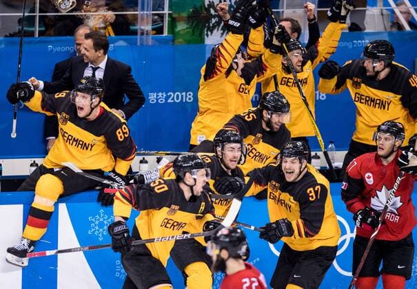 180223 Team Germany celebrates and Mat Robinson of Canada looks dejected after in the Men s Ice hockey Eishockey semifinal between Canada and Germany during day fourteen of the 2018 Winter Olympics on February 23, 2018 in Pyeongchang. Photo: Petter Arvidson BILDBYRAN kod PA 92000 Copyright: PETTERxARVIDSON BB180223PA154