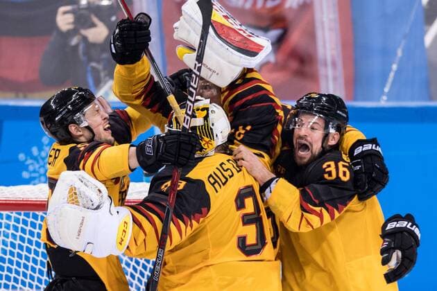 180223 Patrick Hager and Yannic Seidenberg celebrates with goaltender Danny Aus Den Birken of Germany after the Men s Ice hockey Eishockey semifinal between Canada and Germany during day fourteen of the 2018 Winter Olympics on February 23, 2018 in Pyeongchang. Photo: Petter Arvidson BILDBYRAN kod PA 92000 Copyright: PETTERxARVIDSON BB180223PA155