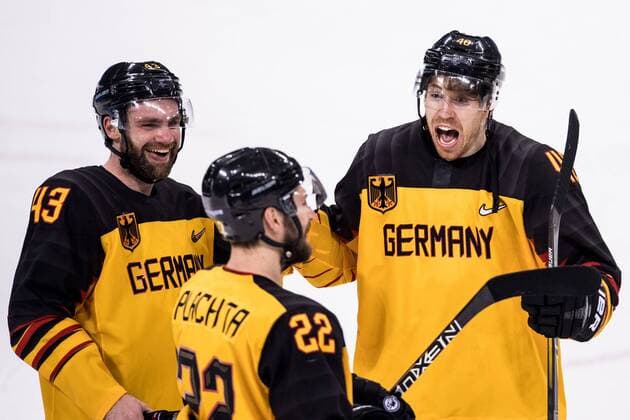 180223 Björn Krupp, Gerrit Fauser and Matthias Plachta of Germany celebrates after the Men s Ice hockey Eishockey semifinal between Canada and Germany during day fourteen of the 2018 Winter Olympics on February 23, 2018 in Pyeongchang. Photo: Petter Arvidson BILDBYRAN kod PA 92000 Copyright: PETTERxARVIDSON BB180223PA167