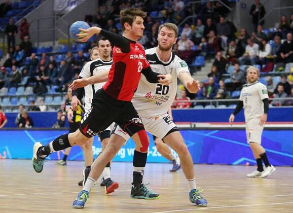 BAU 23.02.2018 Bietigheim Handball SG BBM Bietigheim vs. HC Elbflorenz Dresden, v.l. Felix König (BBM), Nils Holger Kretschmer (Dresden)
