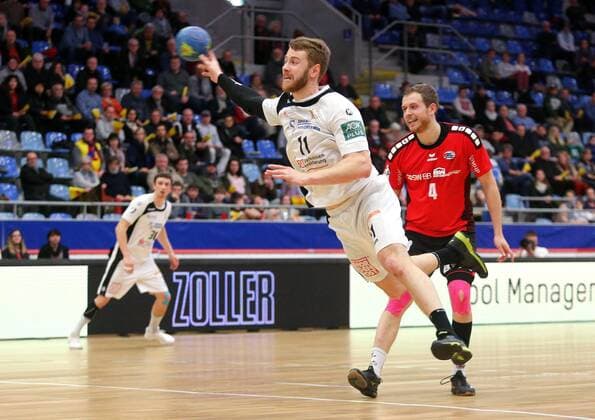 BAU 23.02.2018 Bietigheim Handball SG BBM Bietigheim vs. HC Elbflorenz Dresden, v.l. Arseniy Buschmann (Dresden), Patrick Rentschler (BBM)