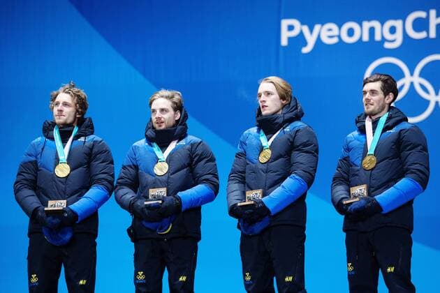 180224 Peppe Femling, Jesper Nelin, Sebastian Samuelsson and Fredrik Lindström of Sweden, Gold celebrates at the Medal Ceremony for the Men s Biathlon 4x7,5 km relay during day fifteen of the 2018 Winter Olympics on February 24, 2018 in Pyeongchang. Photo: Carl Sandin BILDBYRAN kod CS 57999_322 Copyright: CARLxSANDIN BB180224CS097