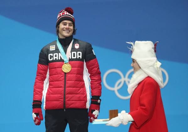 (180224) -- PYEONGCHANG, Feb. 24, 2018 -- Gold medalist Sebastien Toutant (L) of Canada poses for photos during medal ceremony of men s big air of snowboard at the 2018 PyeongChang Winter Olympic Games Olympische Spiele Olympia OS at Medal Plaza, PyeongChang, South Korea, Feb. 24, 2018. ) (SP)OLY-SOUTH KOREA-PYEONGCHANG-SNOWBOARD-MEN S BIG AIR-MEDAL CEREMONY LixGang 