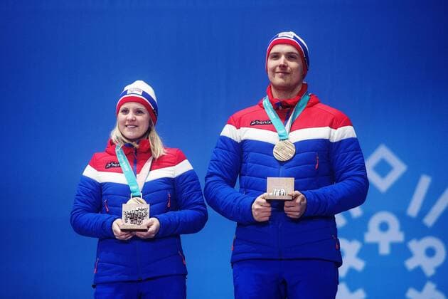 180224 Kristin Moen Skaslien and Magnus Nedregotten of Norway, awarded a bronze after a russian athlete was disqualified, celebrate at the Medal Ceremony for the Mixed Double Curling Event during day fifteen of the 2018 Winter Olympics on February 24, 2018 in Pyeongchang. Photo: Carl Sandin BILDBYRAN kod CS 57999_322 Copyright: CARLxSANDIN BB180224CS148