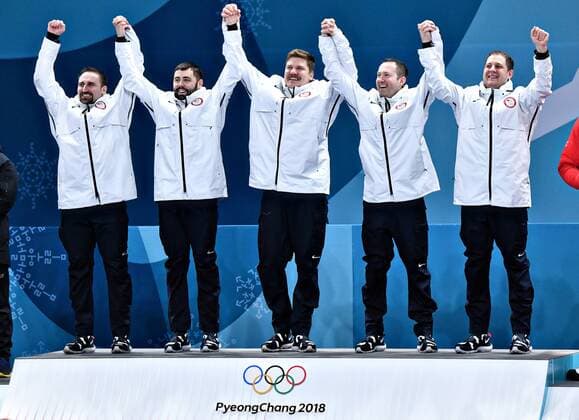 The United States Men s curling team celebrates their gold medal win during the medal ceremony for Men s Curling at the Pyeongchang 2018 Winter Olympics, in the Gangneung Curling Centre in Gangneung, South Korea, on February 24, 2018. The USA won the gold medal for the first time beating Sweden who took the silver and Switzerland the bronze.  OLY20180224502 RICHARDxELLIS