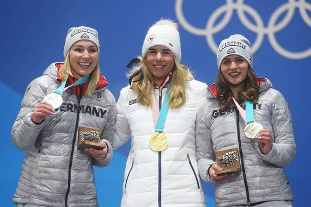 OLYMPICS - 2018 Winter Olympics PYEONGCHANG,SOUTH KOREA,24.FEB.18 - OLYMPICS, SNOWBOARDING - Olympic Winter games Winterspiele Spiele Summer games PyeongChang 2018, Medals Plaza, award ceremony, parallel giant slalom, ladies. Image shows Selina Joerg (GER), Ester Ledecka (CZE) and Ramona Hofmeister (GER). Keywords: medal. GEPAxpictures xMathiasxMandl
