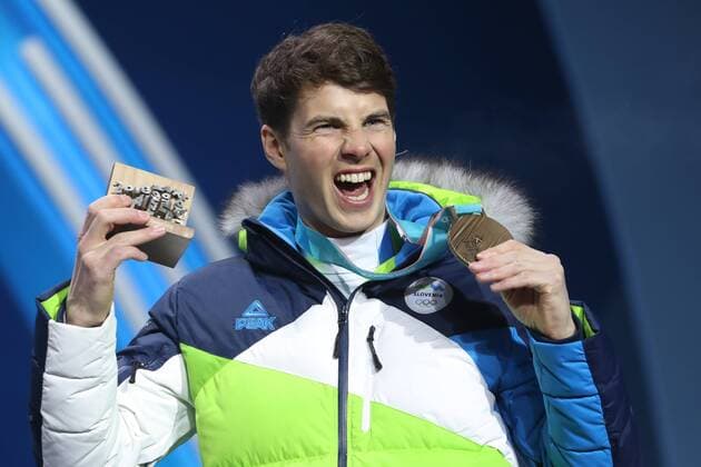 OLYMPICS - 2018 Winter Olympics PYEONGCHANG,SOUTH KOREA,24.FEB.18 - OLYMPICS, SNOWBOARDING - Olympic Winter games Winterspiele Spiele Summer games PyeongChang 2018, Medals Plaza, award ceremony, parallel giant slalom, men. Image shows Zan Kosir (SLO). Keywords: medal. GEPAxpictures xMathiasxMandl