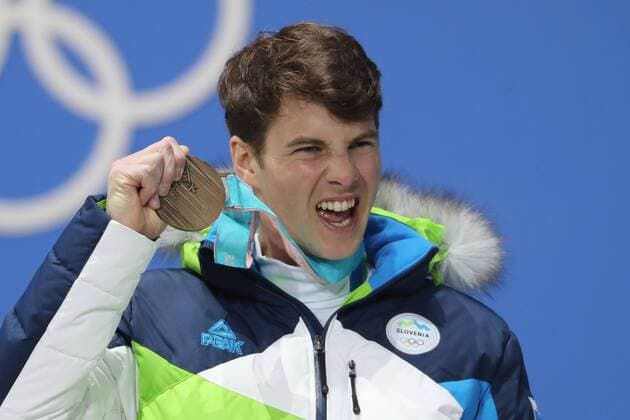 OLYMPICS - 2018 Winter Olympics PYEONGCHANG,SOUTH KOREA,24.FEB.18 - OLYMPICS, SNOWBOARDING - Olympic Winter games Winterspiele Spiele Summer games PyeongChang 2018, Medals Plaza, award ceremony, parallel giant slalom, men. Image shows Zan Kosir (SLO). Keywords: medal. GEPAxpictures xMathiasxMandl