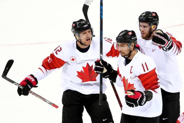 GANGNEUNG, SOUTH KOREA - FEBRUARY 24, 2018: Canada s Rob Klinkhammer, Chris Kelly and Quinton Howden (L-R) celebrate a goal against the Czech Republic in the men s bronze medal Ice hockey Eishockey game at Gangneung Hockey Centre at the 2018 Winter Olympic Games Olympische Spiele Olympia OS Valery Sharifulin TASS  TS07595E