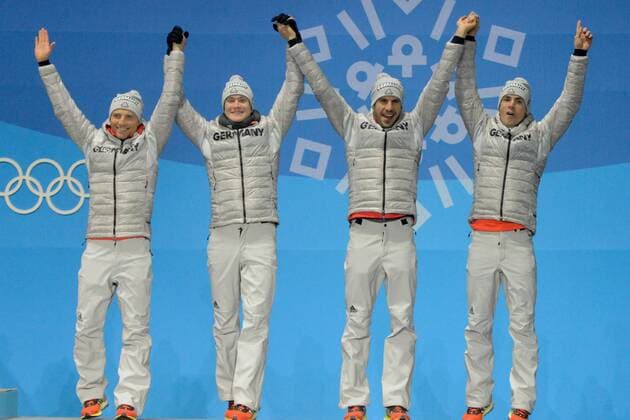 February 24, 2018 - Pyeongchang, South Korea - The biathlon team from Germany celebrate winning the bronze medal from the Men s 4 x 7.5km Relay event in the PyeongChang Olympic Games Olympische Spiele Olympia OS .Team members : Erik LESSER Benedikt DOLL Arnd PEIFFER Simon SCHEMPP Pyeongchang 18: Medal Winners - ZUMAl132 20180224_zap_l132_051 Copyright: xChristopherxLevyx