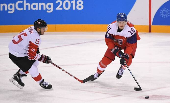 (180224) -- PYEONGCHANG, Feb. 24, 2018 -- Dominik Kubalik (R) of the Czech Republic vies for the puck against Canada during the men s bronze medal game of Ice hockey Eishockey at the 2018 PyeongChang Winter Olympic Games Olympische Spiele Olympia OS at Gangneung Hockey Centre, Gangnueng, South Korea, Feb. 24, 2018. Canada won 6-4 and claimed the bronze medal. ) (SP)OLY-SOUTH KOREA-PYEONGCHANG-ICE HOCKEY-MEN S BRONZE MEDAL GAME WangxHaofei 