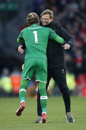 Bilder des Tages - SPORT Jurgen Klopp manager of Liverpool enjoys the win with Loris Karius of Liverpool during the premier league match at the Anfield Stadium, Liverpool. Picture date 24th February 2018. Picture credit should read: Simon Bellis Sportimage EDITORIAL USE ONLY. No use with unauthorised audio, video, data, fixture lists, club league logos or live services. Online in-match use limited to 120 images, no video emulation. No use in betting, games or single club league player publications.