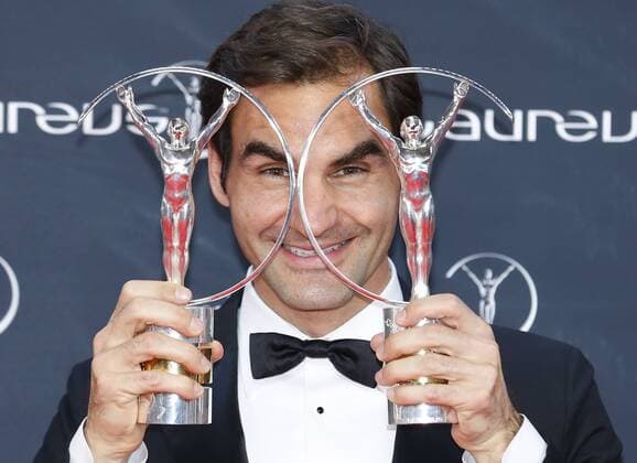 (180228) -- MONACO, Feb. 28, 2018 -- Swiss tennis player Roger Federer poses with the Sportsman Award and Comeback Awards at the 2018 Laureus World Sports Awards in Monaco, on Feb. 27, 2018. ) (SP)MONACO-LAUREUS AWARDS-WINNERS YexPingfan 