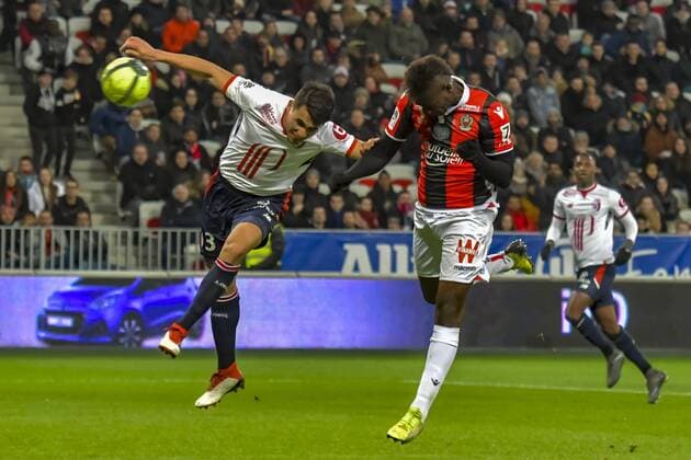 Junior Alonso (Lille) - Mario Balotelli (OGC Nice) FOOTBALL : OGC Nice vs Lille - Ligue 1 - Nice - 02 03 2018 NorbertScanella Panoramic 
