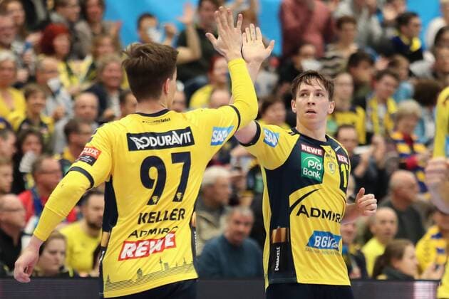 v.li.: Rico Keller (RNL, 97), Jerry Tollbring (RNL, 17), jubeln über ein Tor, Jubel, Torjubel, Torerfolg, celebrate the goal, goal, celebration, Jubel ueber das Tor, optimistisch, Action, Aktion, Handball, Champions League, Rhein-Neckar Löwen - HBC Nantes,