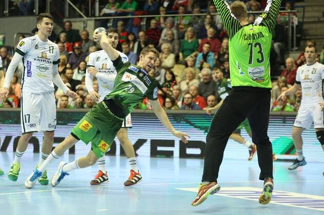 04.03.2018, xcsx, Handball EHF Pokal, SC Magdeburg - Tatran Presov, emspor, v.l. Gleb Kalarash (SC Magdeburg), throw, wirft gegen Igor Chupryna (Tatran Presov) Magdeburg