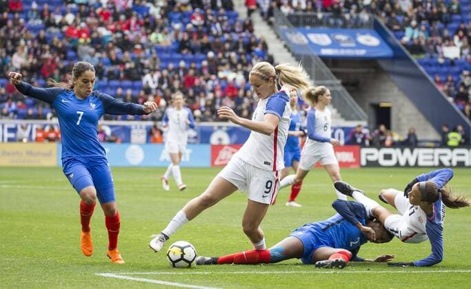 HARRISON, NJ - MARCH 04: Lindsey Horan (9) of the USWNT on the ball with Amel Majri (7) of France as Aissatou Tounkara (2) of France and Mallory Pugh (11) of the USWNT crash to the turf during a She Believes Cup match between the USWNT and France on March 04, 2018, at Red Bull Arena, in Harrison, N.J. The game ended in a 1-1 tie. (Photo by Tony Quinn Icon Sportswire) SOCCER: MAR 04 SheBelieves Cup - USA v France Icon25518030435 EDITORIAL USE ONLY