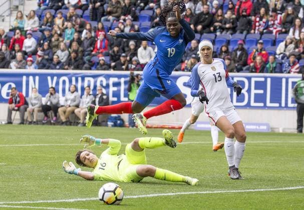 HARRISON, NJ - MARCH 04: Alex Morgan (13) of the USWNT watches as Sara Bouhaddi (16) and Griedge Mbock Bathy (19) of France clear the ball during a She Believes Cup match between the USWNT and France on March 04, 2018, at Red Bull Arena, in Harrison, N.J. The game ended in a 1-1 tie. (Photo by Tony Quinn Icon Sportswire) SOCCER: MAR 04 SheBelieves Cup - USA v France Icon25518030439 EDITORIAL USE ONLY