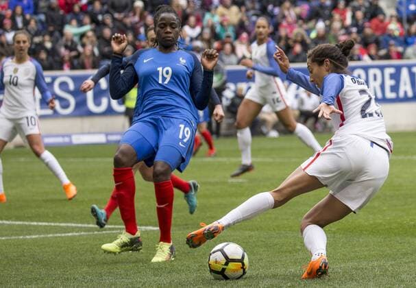 HARRISON, NJ - MARCH 04: Christen Press (23) of the USWNT pulls the ball away from Griedge Mbock Bathy (19) of France during a She Believes Cup match between the USWNT and France on March 04, 2018, at Red Bull Arena, in Harrison, N.J. The game ended in a 1-1 tie. (Photo by Tony Quinn Icon Sportswire) SOCCER: MAR 04 SheBelieves Cup - USA v France Icon25518030479 EDITORIAL USE ONLY