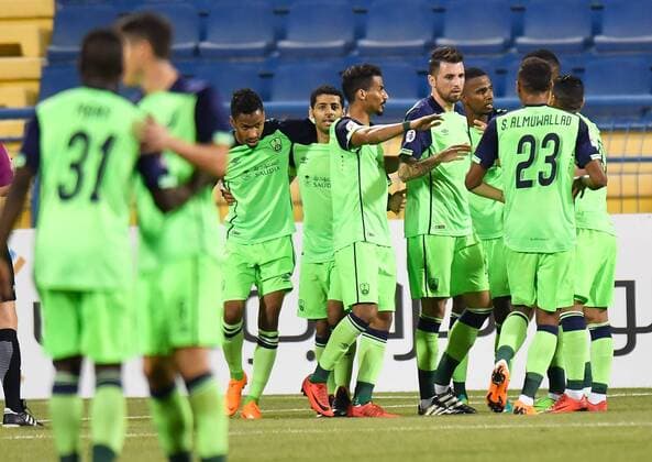 (180306) -- DOHA, March 6, 2018 -- Players of Al Ahli celebrate their first goal during the AFC Champions League Group A soccer match between Qatar s Al-Gharafa and Saudi Arabia s Al Ahli at Thani bin Jassim Stadium in Doha, Capital of Qatar, March 5, 2018. The match ended with a 1-1 draw. ) (SP)QATAR-DOHA-SOCCER-AFC-AL GHARAFA VS AL AHLI Nikku 
